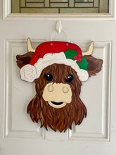 Load image into Gallery viewer, Christmas Highland Cow Door Hanger
